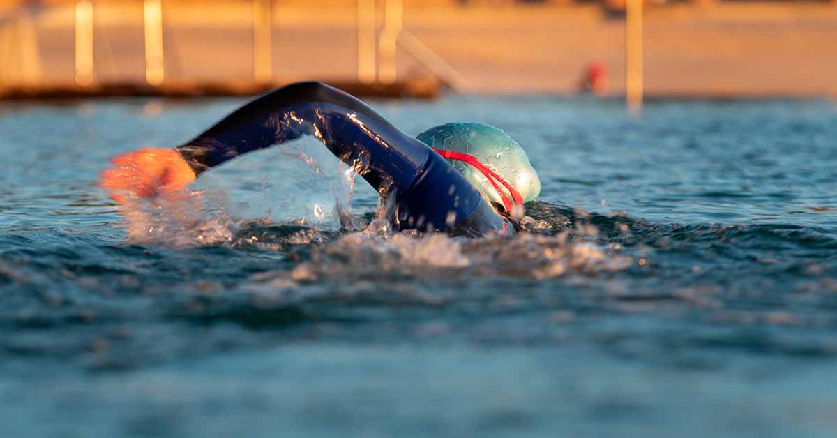 Person Swimming Front Crawl in Open Water